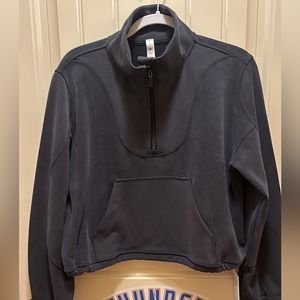 Lululemon Softstreme ribbed half zip in black. Size 10. New with tags